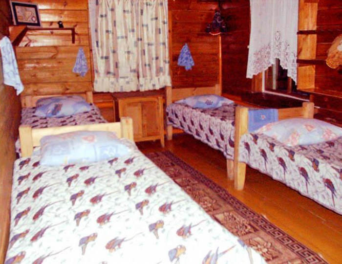 Кровать в 4-местном общем номере (с пансионом) - Отель «Русский Дом» Язово