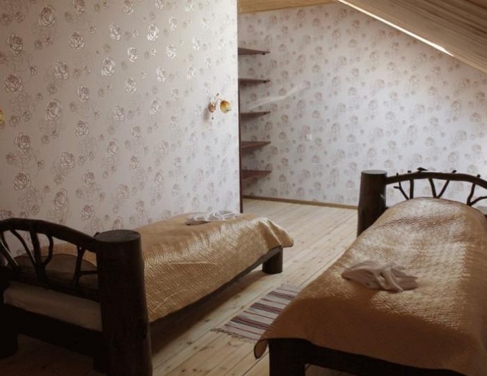 Номер люкс с 2 односпальными и 1 двуспальной кроватью - База отдыха «Большая Медведица» Повенец