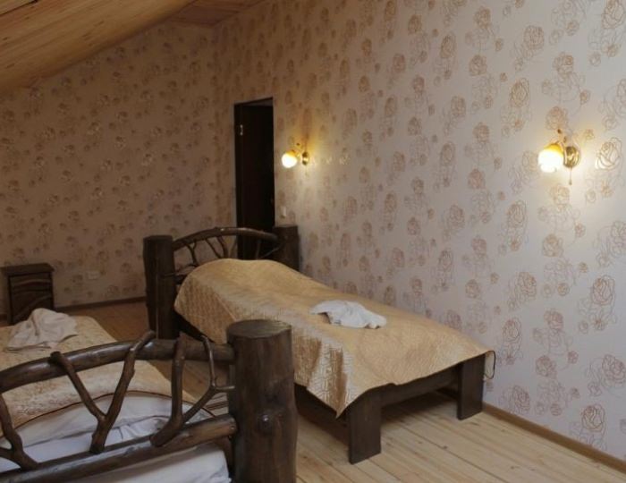 Номер люкс с 2 односпальными и 1 двуспальной кроватью - База отдыха «Большая Медведица» Повенец