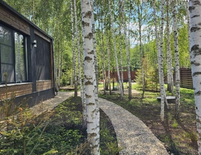 Коттедж «Пaноpaмный дом в хвойнoм лесу с сaуной» Ступино