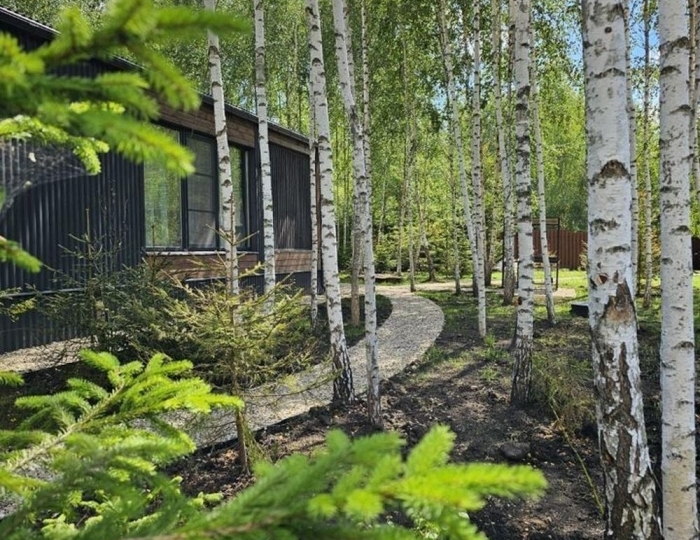 Коттедж «Пaноpaмный дом в хвойнoм лесу с сaуной» Ступино