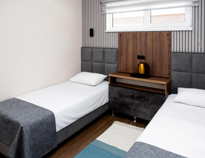 Номер стандарт с 2 односпальными кроватями - База отдыха «Клевое Никольское» Никольское