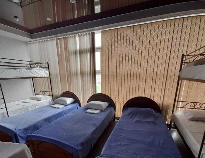 Кровать в общем номере c 2 двухъярусными и 3 односпальными кроватями (удобства на этаже) - Мини-отель «Вершина» Нальчик