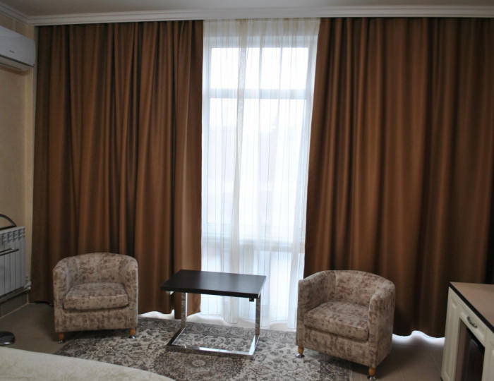 Белый Люкс с 1 двуспальной кроватью - Мини-отель «Капитан» Орел